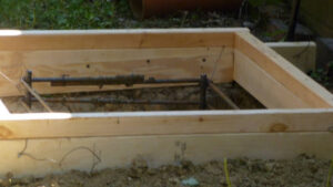 Concrete forms in place for antenna base.