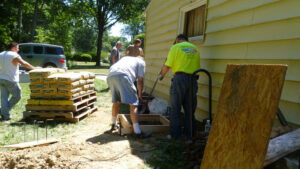 W8GMF vibrating concrete with KG9Z supervising.