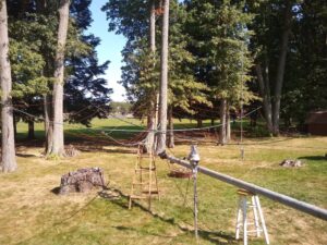 Hex beam antenna mounted to antenna tower using