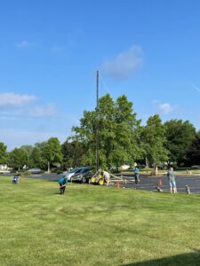 WARC members installing guy wires on portable antenna tower for 2021 ARRL Field day