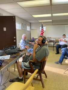 Garry W8GMF operating HF transciever at 2021 ARRL field day